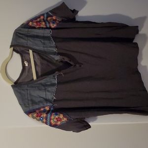 Free people boho loose Tshirt khaki like color. wears well with shorts and jeans